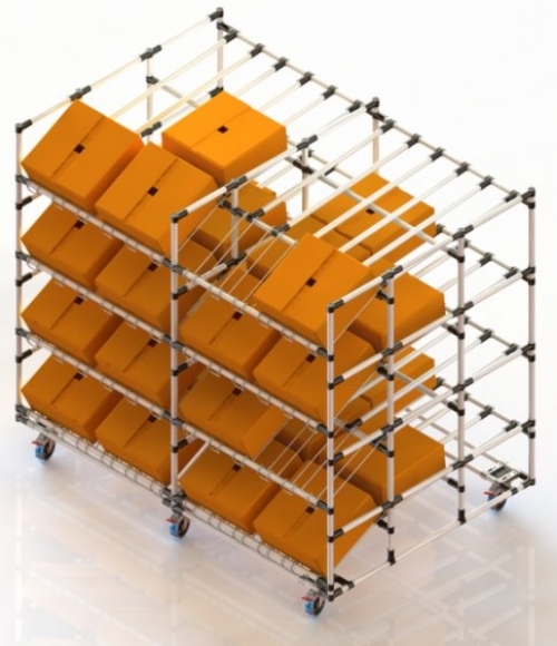 Magazyn dynamiczny z podwójnym nachyleniem do kartonowych pudełek.  4-poziomowa struktura załadunku na kołach obrotowych.
